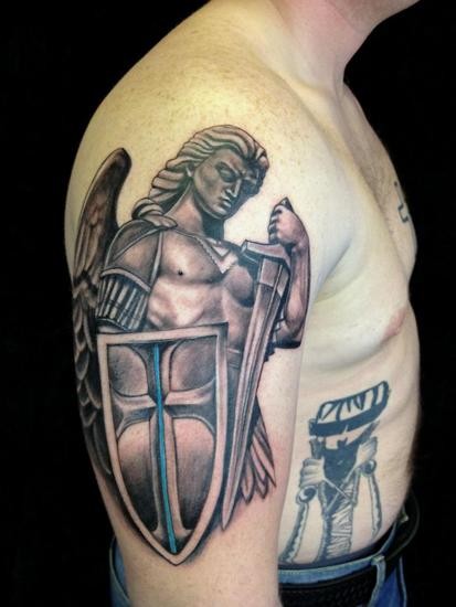 Beautiful archangel michael in armor tattoo on half sleeve ...